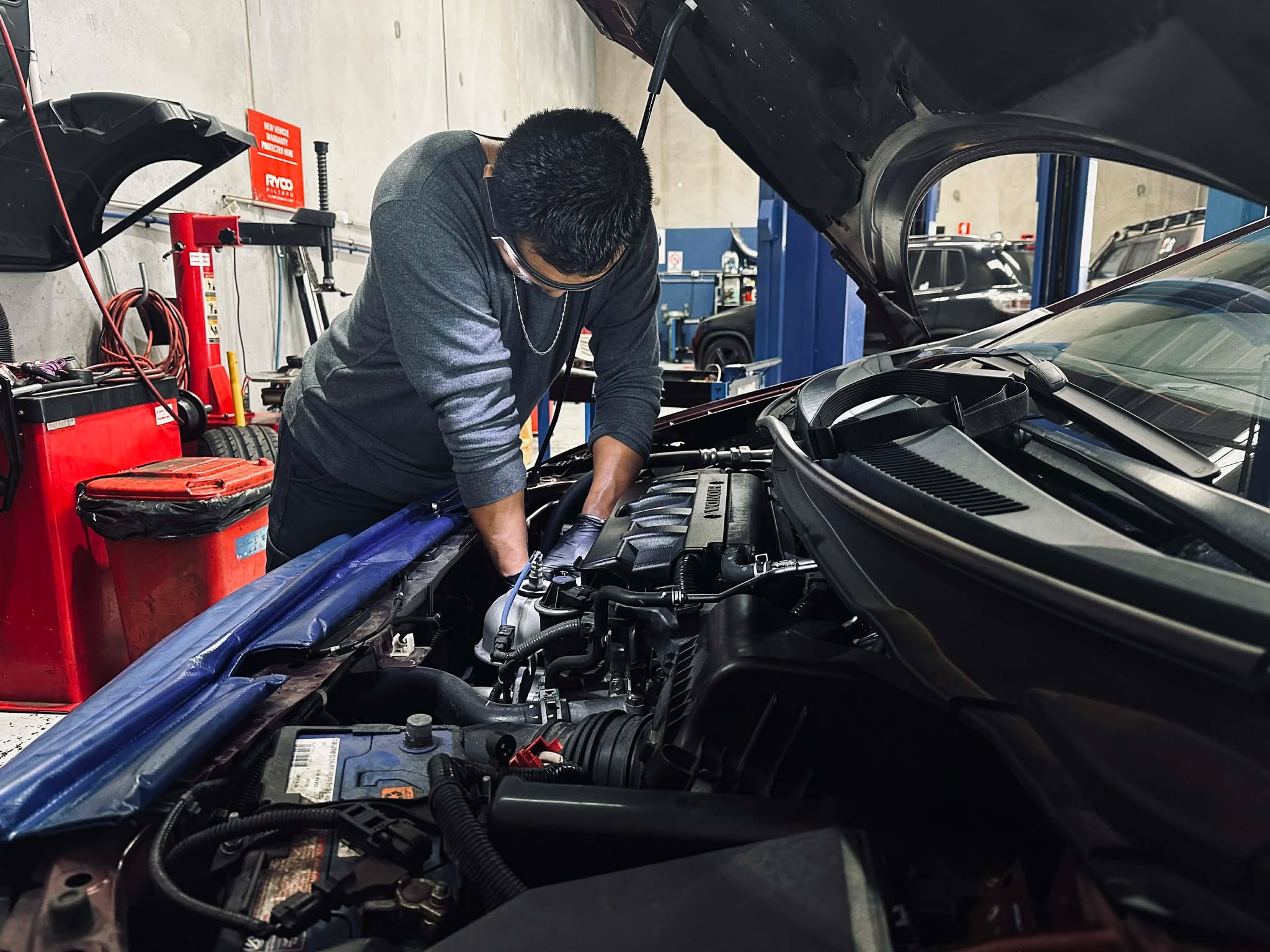 Highpoint Mechanical team servicing a car in Maidstone